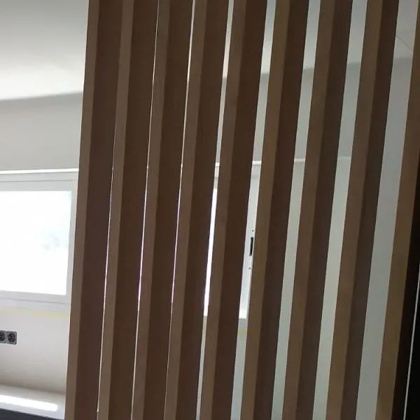 Timber slat screen beside the kitchen, Camp de Mar