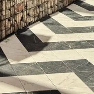 Graphic black-and-white floor by the bar at La Loba